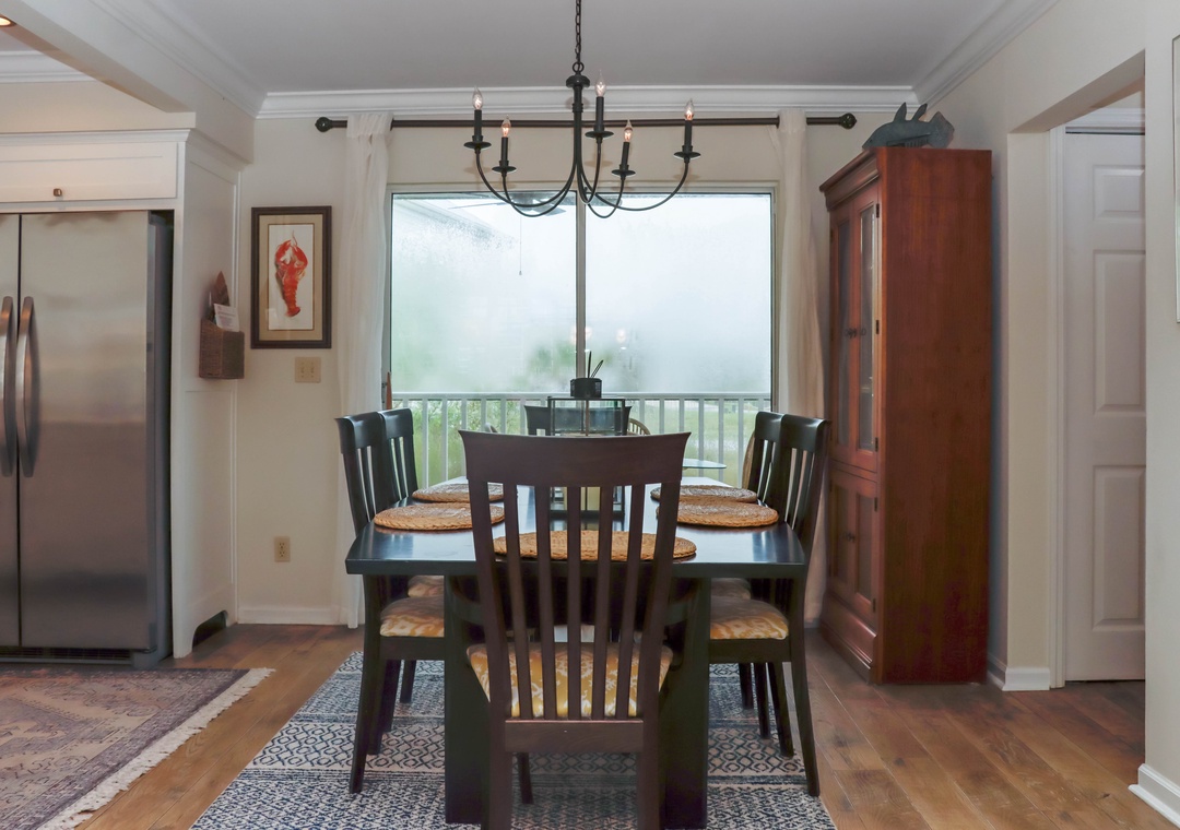 Dining Area with View onto Screened Deck