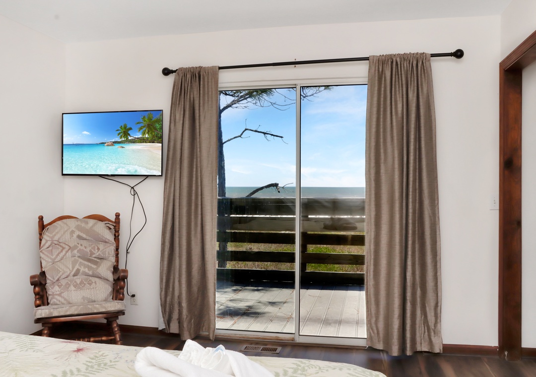Bedroom 1 with View onto Beach Front Deck