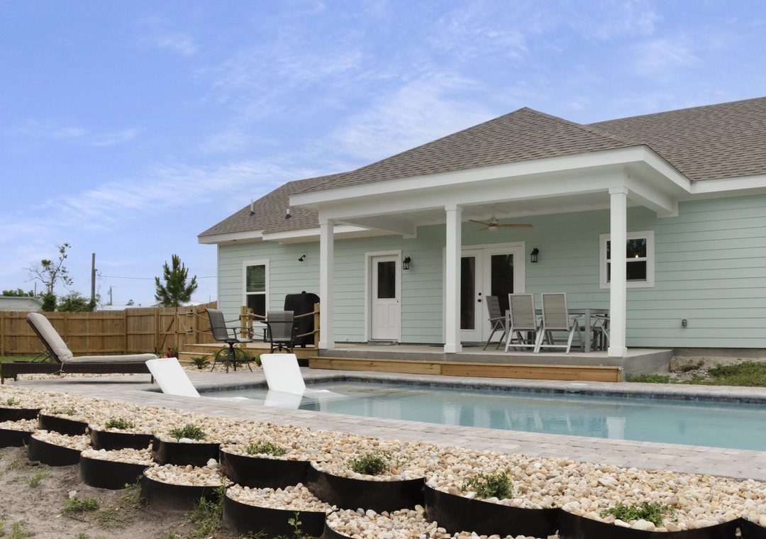 Swimming Pool with Overlooking Back Porch