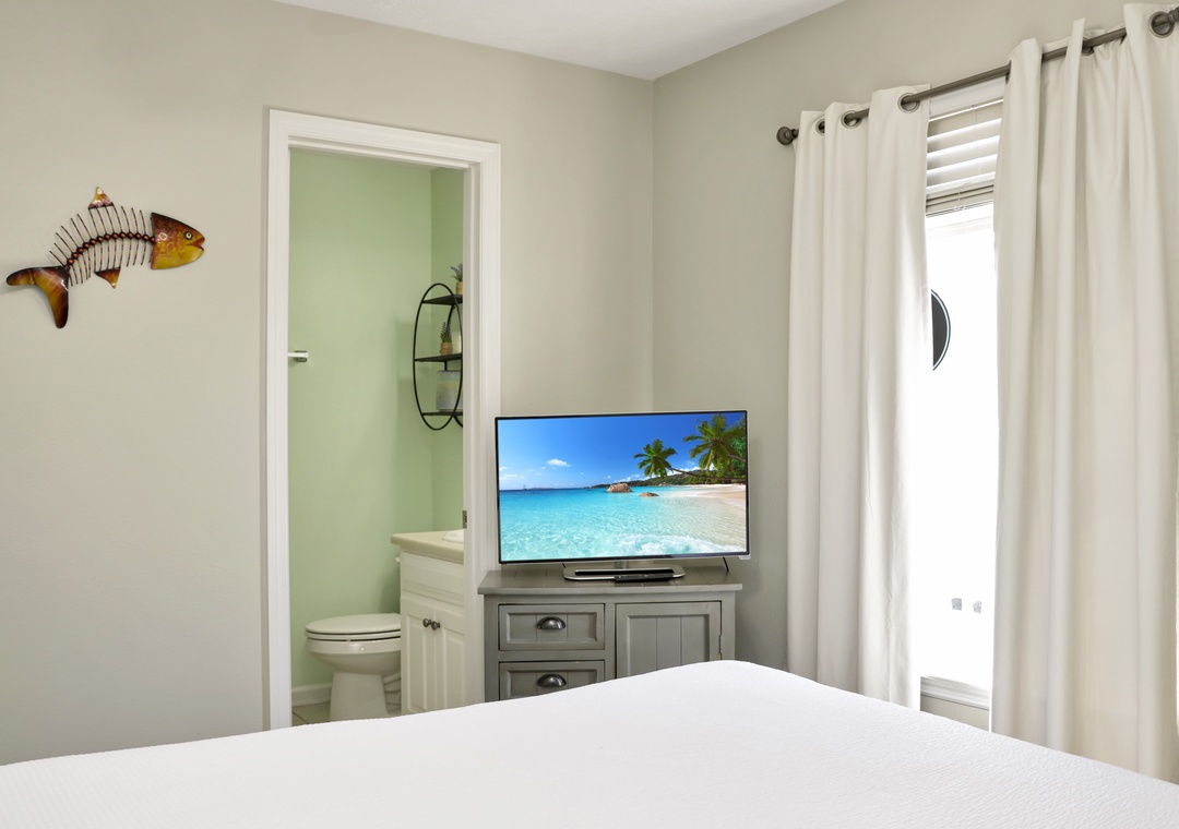 Bedroom 1 with TV and Full Bathroom