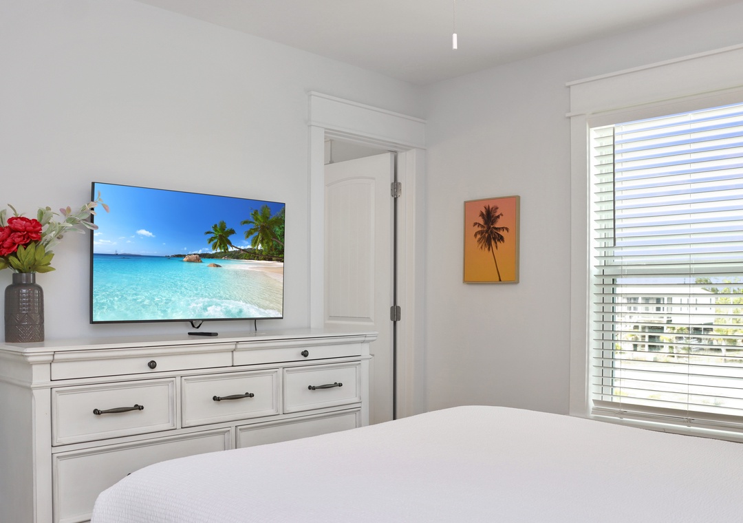 Bedroom 2 with TV and Master Bathroom
