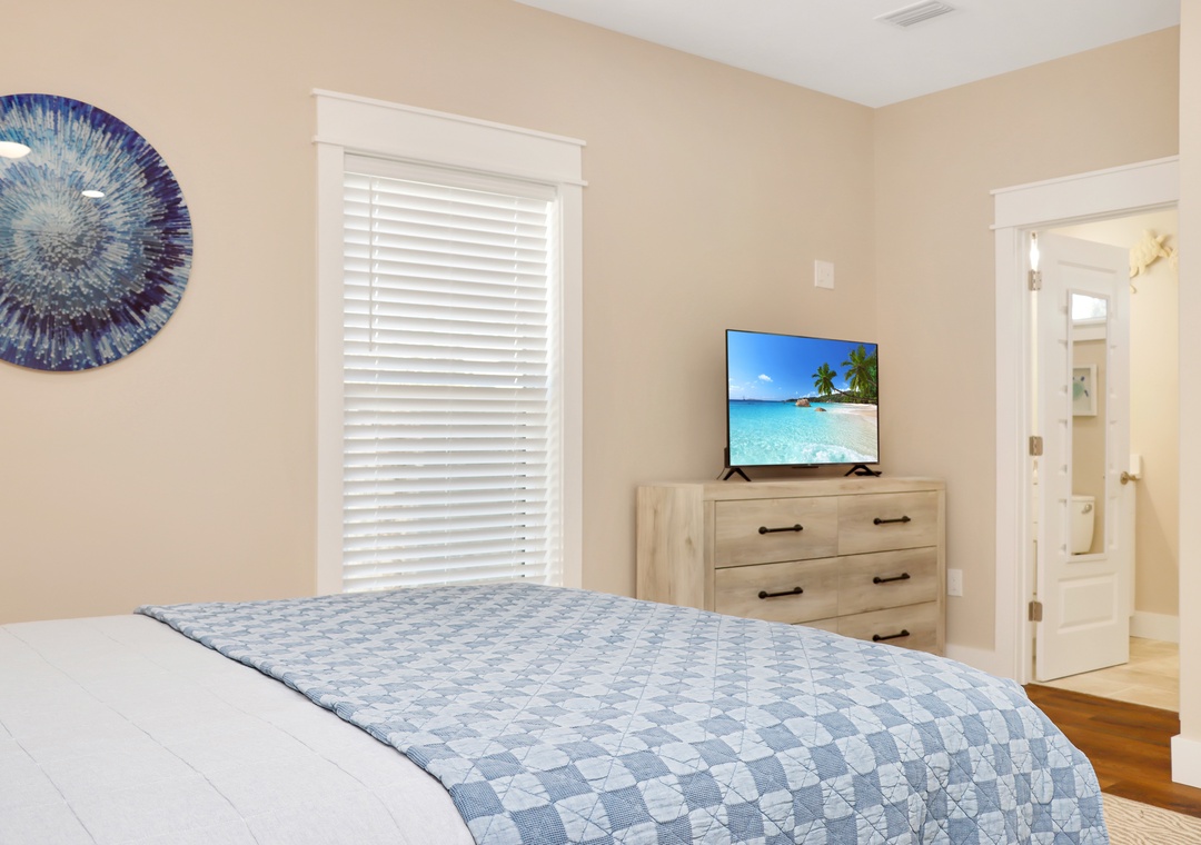 Bedroom 2 with TV and Master Bathroom
