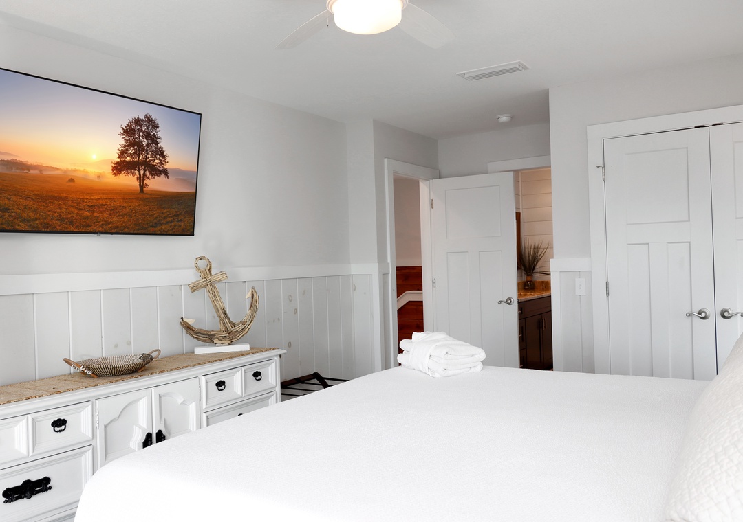 Bedroom 2 with TV and Master Bathroom