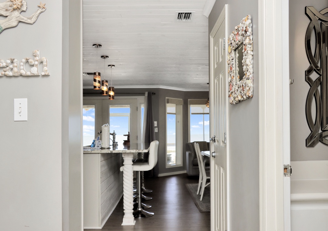 Hallway to Living Area and Bathroom