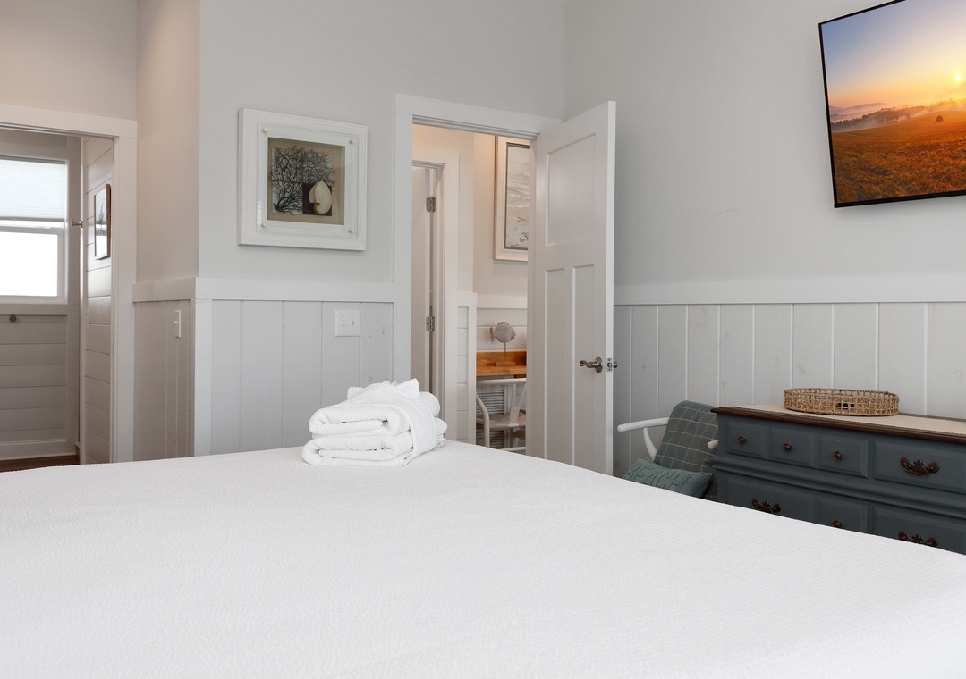 Bedroom 1 with TV and Master Bathroom