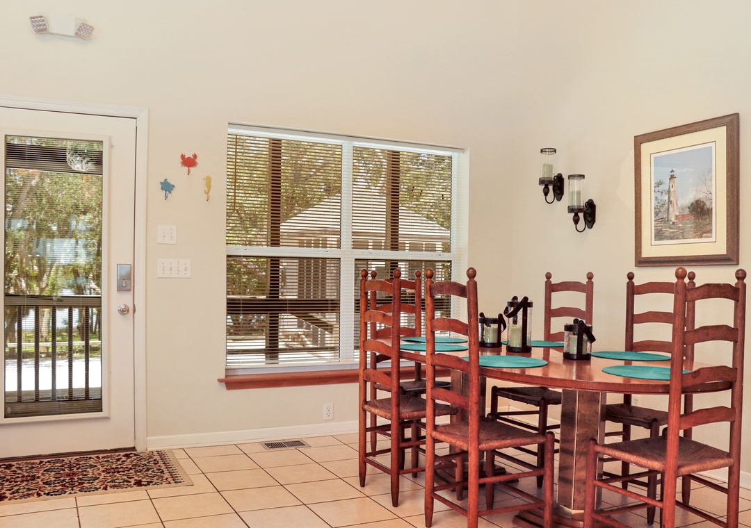 Dining Area with View onto Screened Porch