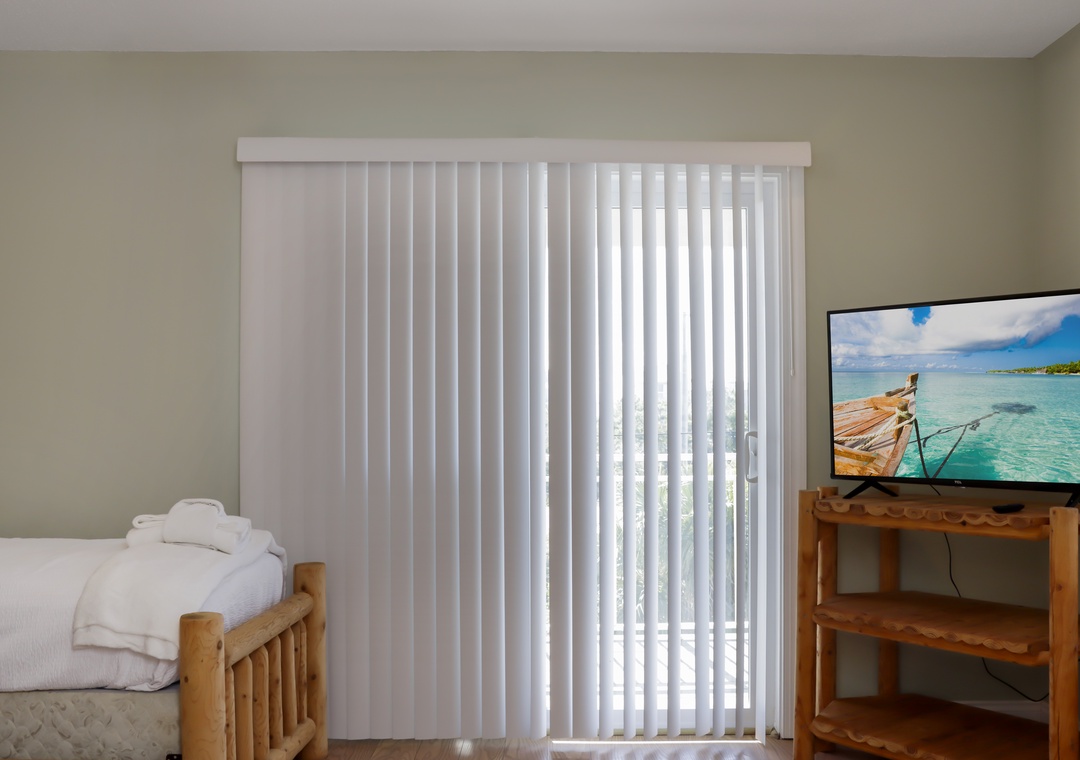 Bedroom 3 with Beach View Deck and TV