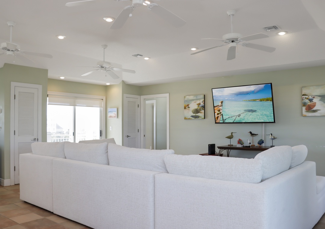 Living Room with TV and Beach View Deck