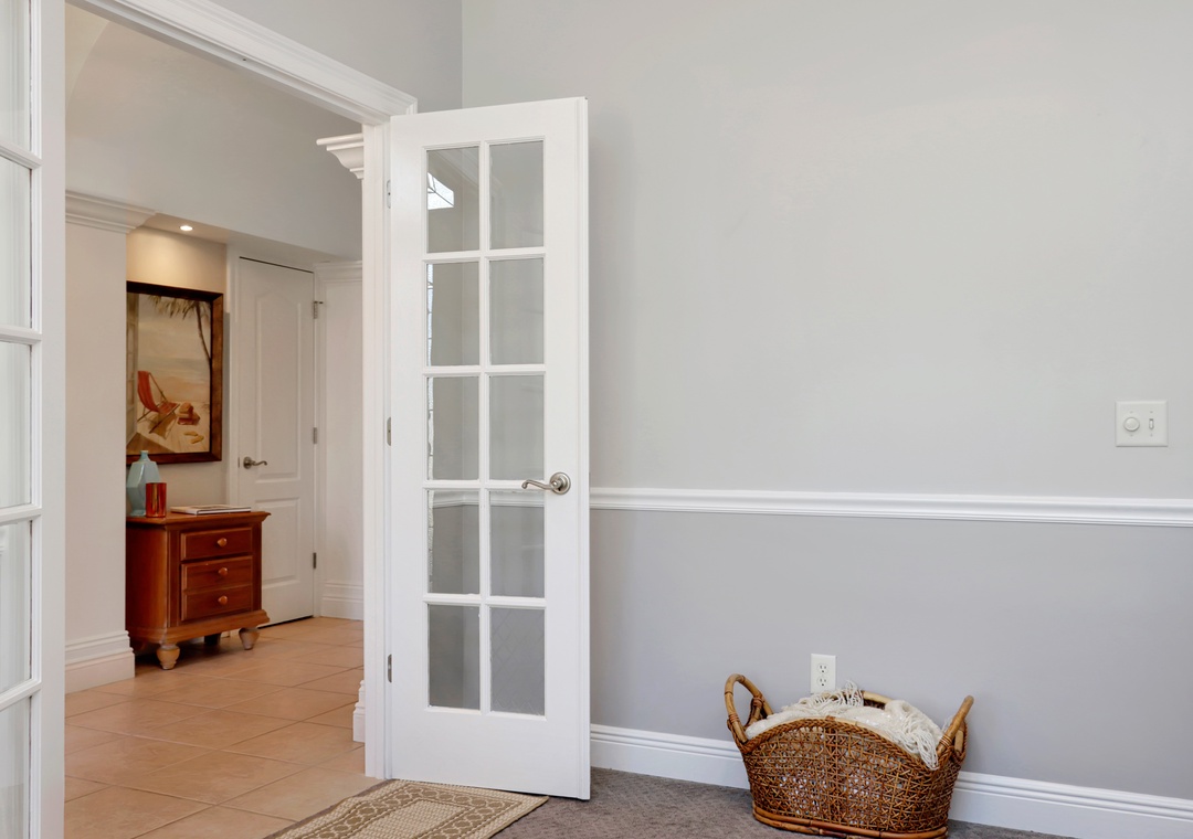 French Doors Separate Den from Foyer