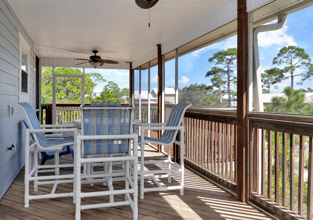 Screened Deck with Outdoor Dining and Fans
