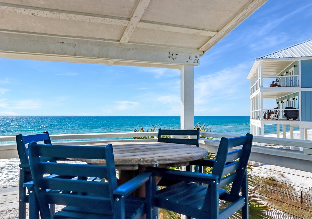 Dine al fresco on the beachfront deck