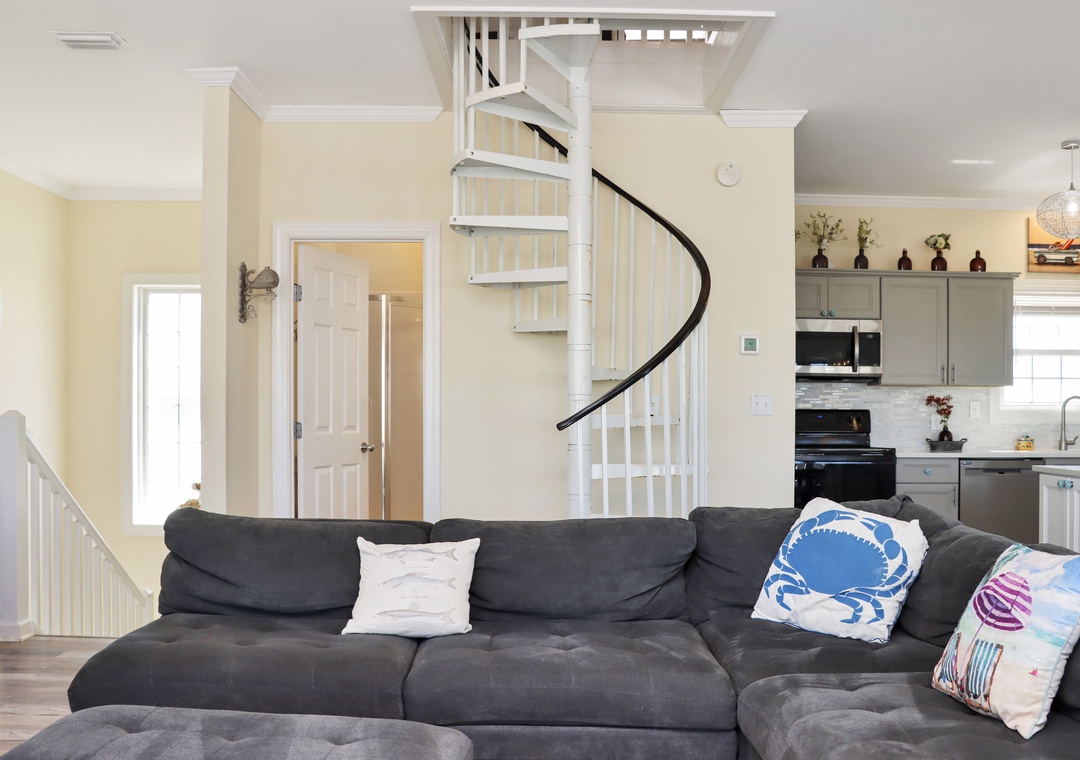 Living Room with Full Bathroom and Spiral Staircase