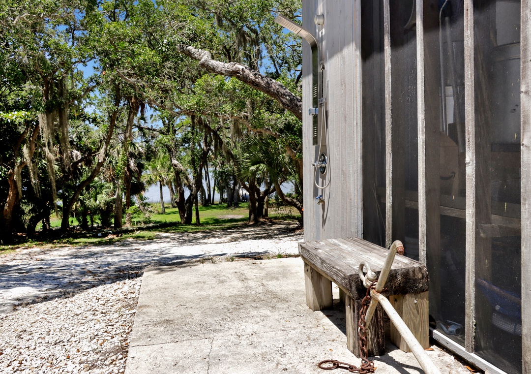 Outdoor Shower on Side of Outhouse