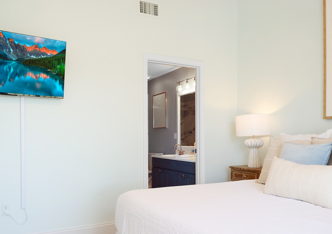 Master Bedroom 1 with TV and Full Bathroom