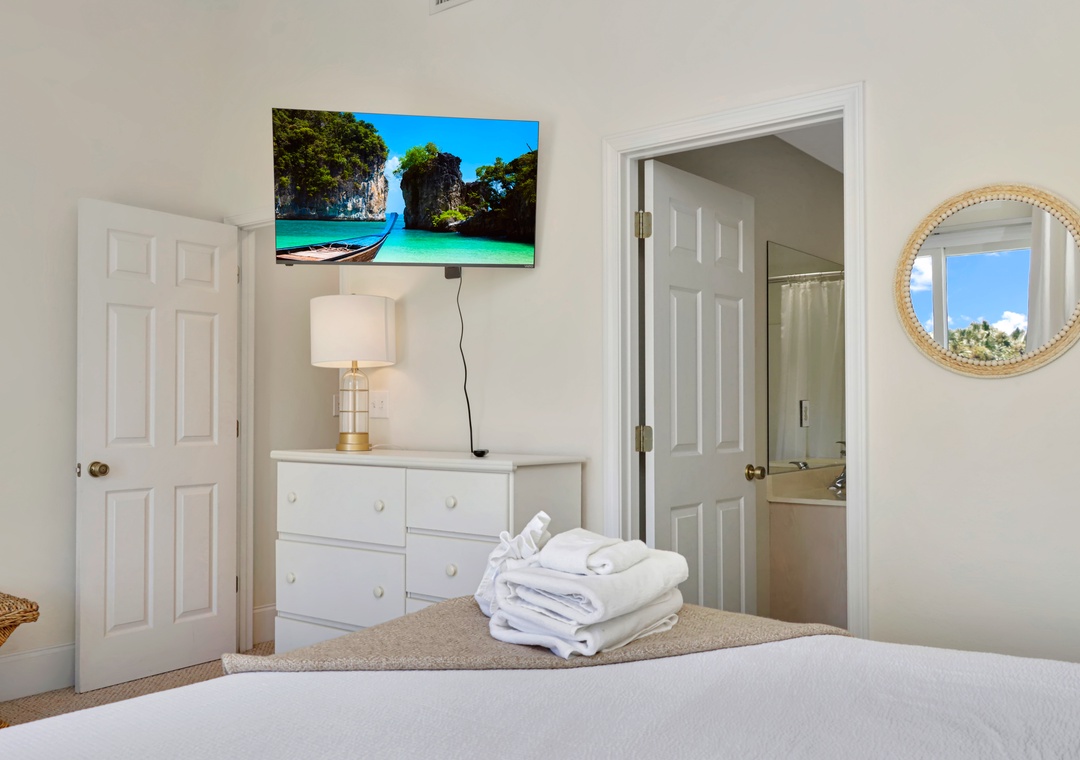 Bedroom 1 with TV and Master Bathroom