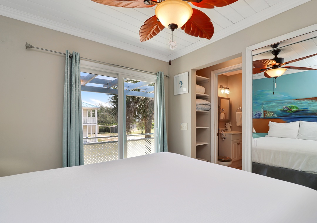 Bedroom 2 with Full Bath Access and Deck View