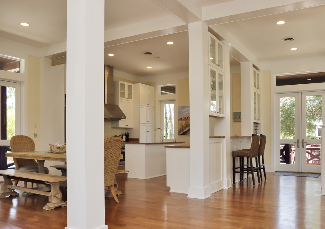 Kitchen with Bar Seating and Dining Area