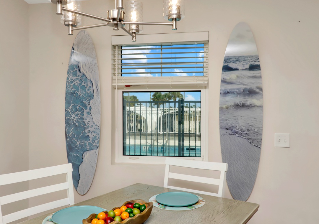 Dining Area with View of Community Pool