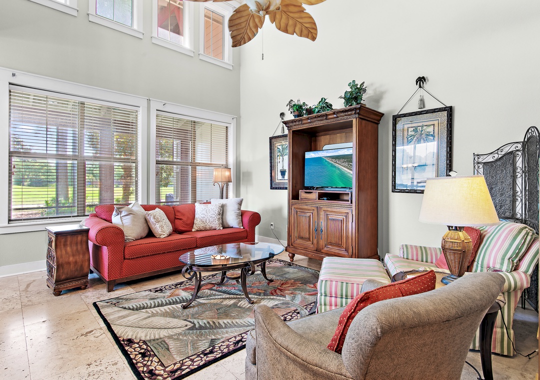 Bright, open living room with soaring ceilings