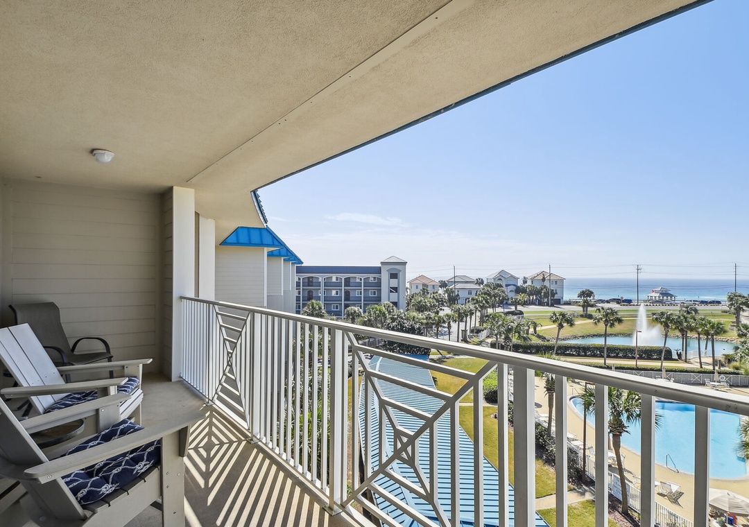 Private balcony with resort and water views