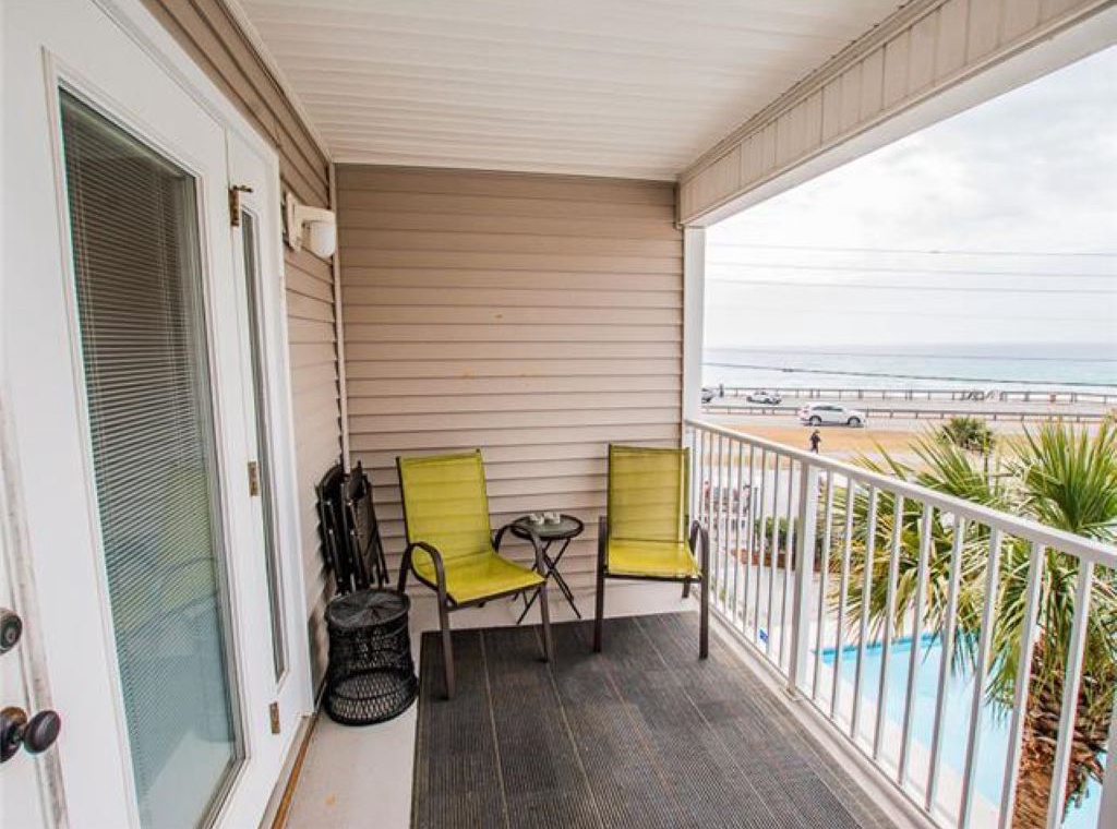 Balcony with a View of Ocean and Pool