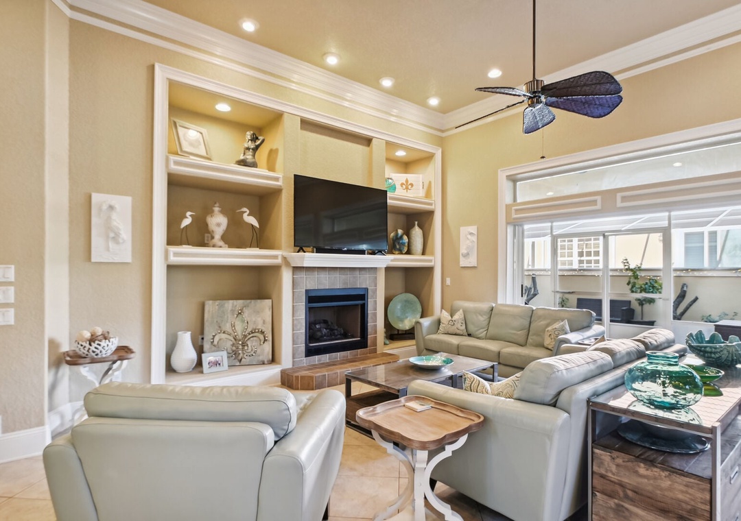 Spacious living room with large flat-screen TV