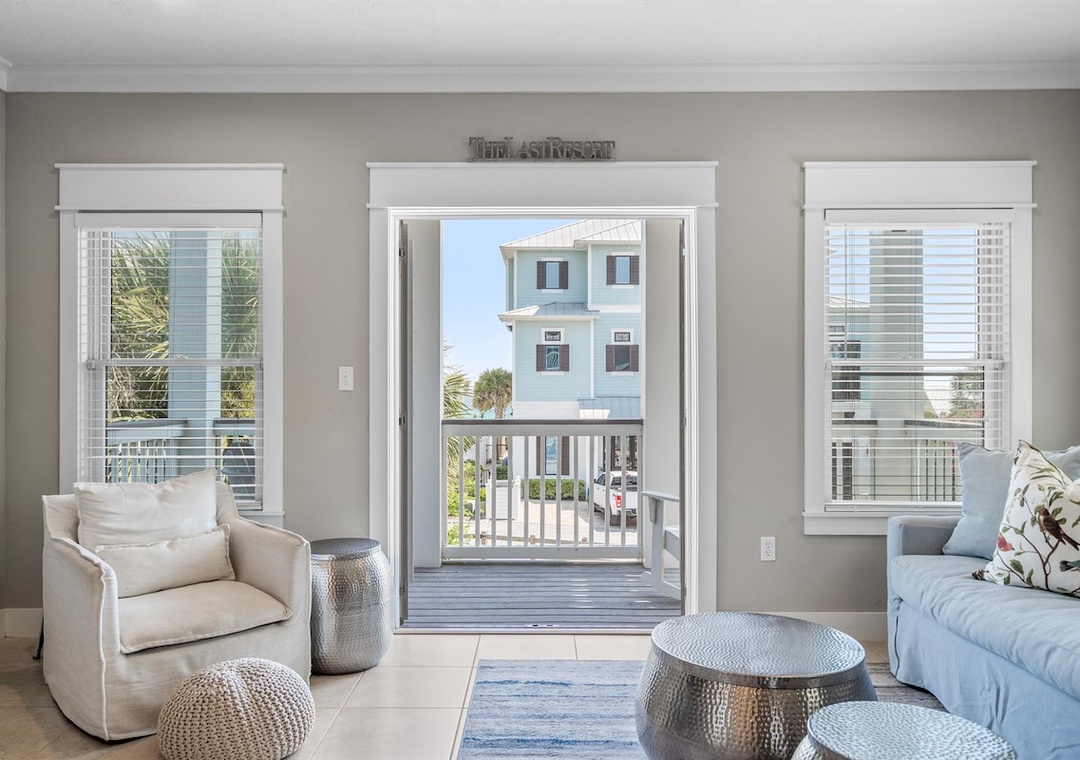Comfortable sitting area that opens to a private balcony,