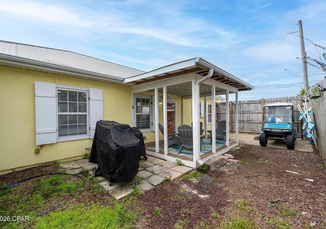 Backyard w/ Covered Seating, Firepit, and Grill