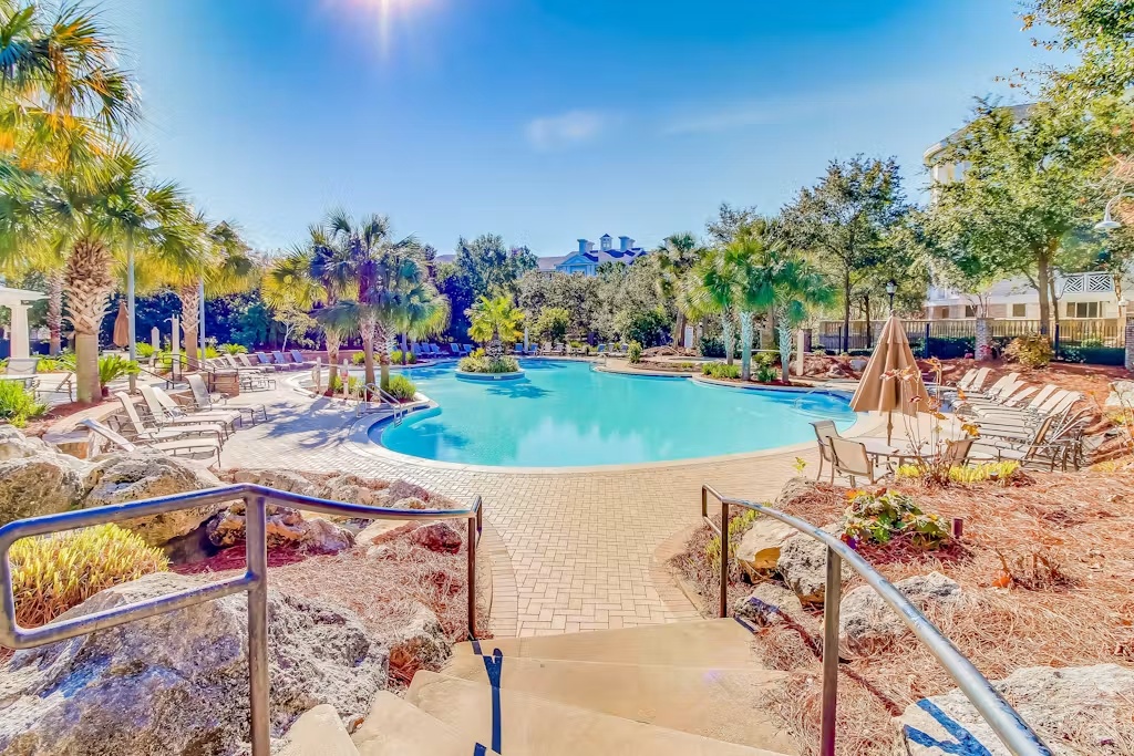 Spend sunny afternoons at the expansive lagoon-style pool with plenty of lounge seating