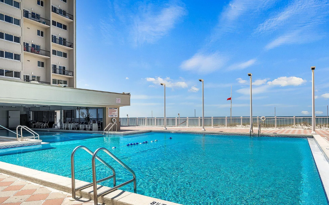 Resort-Style Pool with Endless Coastal Views