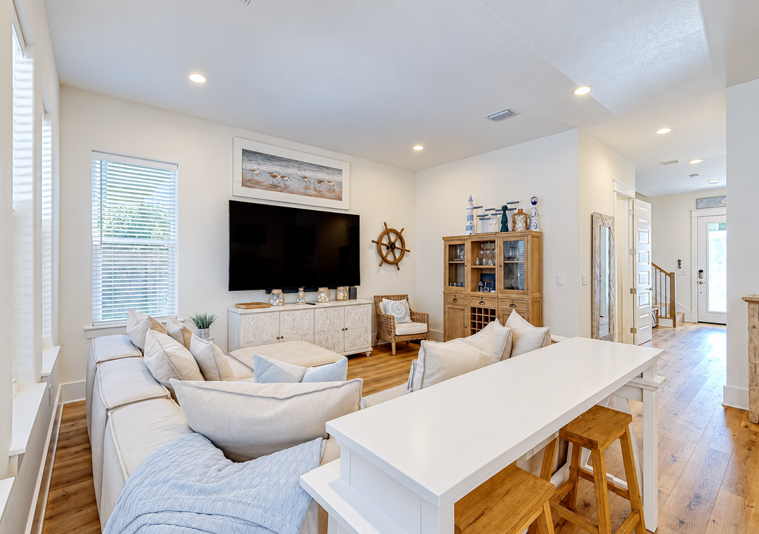 Gorgeous Coastal Living Room with a 65' Flatscreen