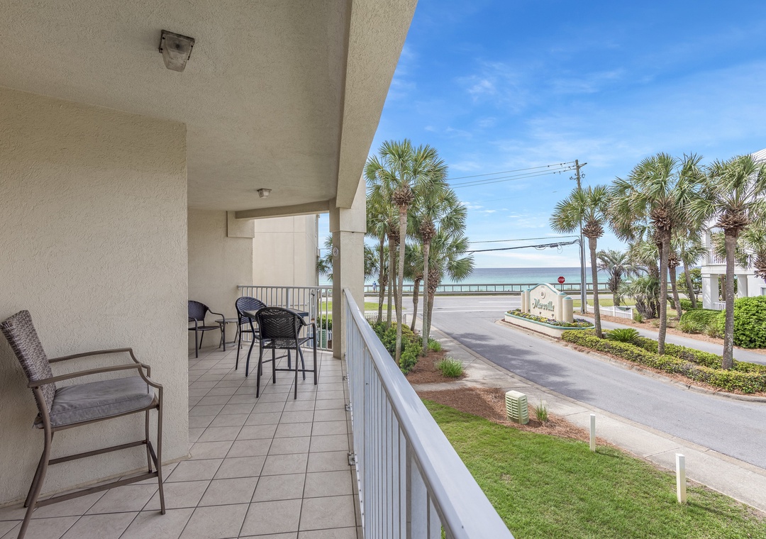Balcony overlooking the palms and the water
