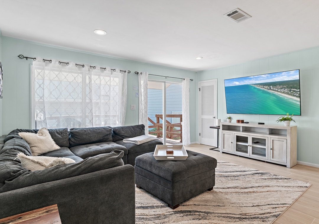 Living room with large flat-screen TV