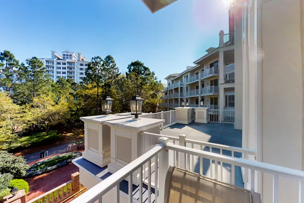 Private balcony overlooking the peaceful resort grounds