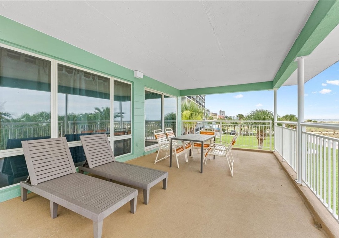 Great Private Balcony Space with Outside Dining and Lounge Chairs