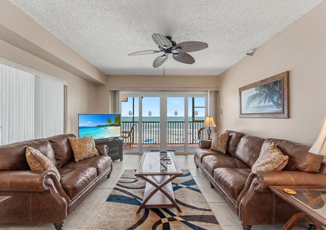 Spacious Living Area with Gulf Views and Balcony Access