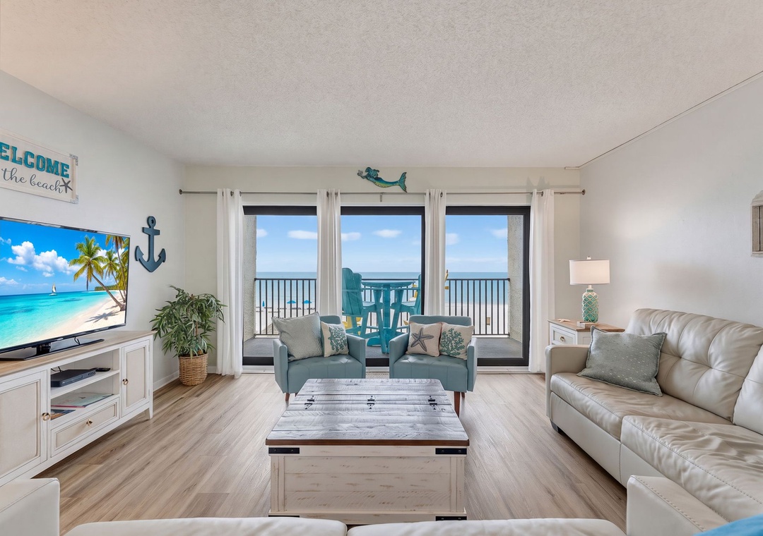 Spacious Living Area with Balcony Access and Direct Beach and Gulf Views