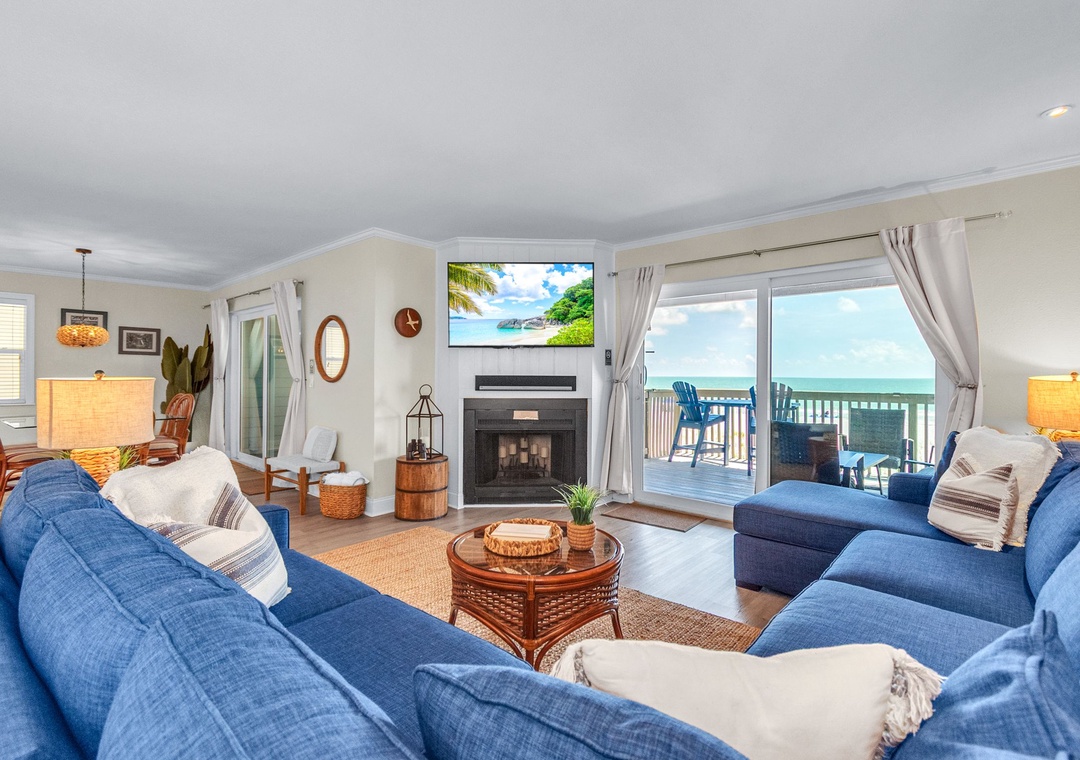 Spacious Living Area with Gulf Views and Balcony Access