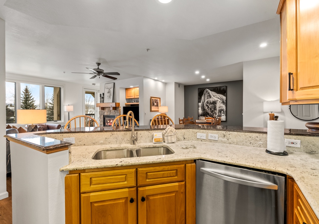 Your fully-equipped kitchen flows seamlessly into the living space, perfect for preparing meals while staying connected with family.