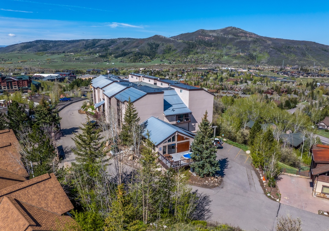 This property sits nestled in a scenic mountain valley, surrounded by rolling hills and established residential neighborhoods. The expansive grounds offer a peaceful retreat with natural beauty at your doorstep.