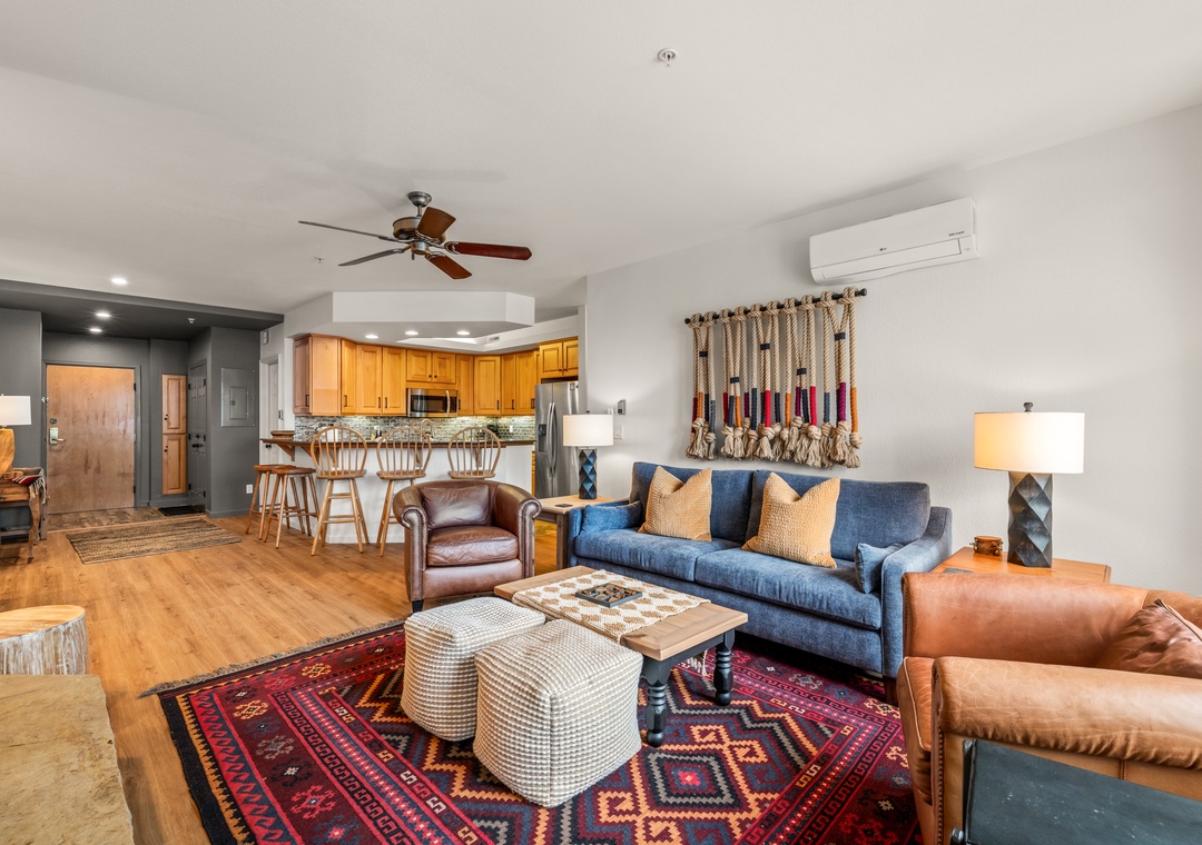 Relax in your beautifully appointed living space where southwestern style meets modern comfort, complete with cozy seating and mountain-inspired decor.