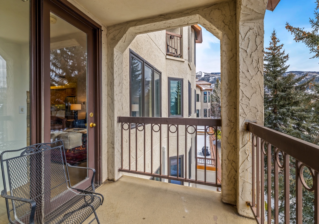 Step out onto your private balcony and breathe in the crisp mountain air while enjoying stunning views of snow-capped peaks.