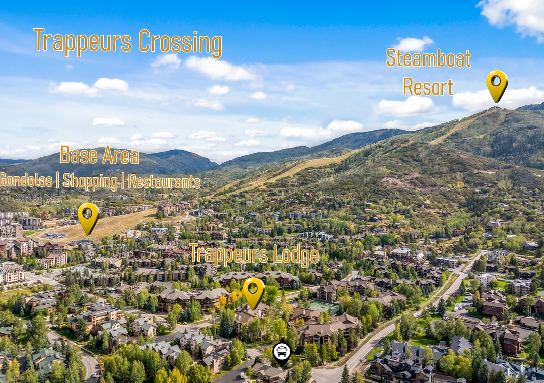 Steamboat Resort area featuring the base village with condos, shopping, and dining, along with nearby lodges and scenic mountain surroundings.