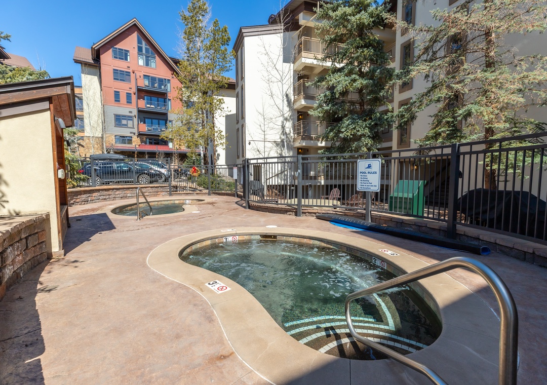 Unwind in the bubbling hot tub surrounded by mountain air, or slip into the adjacent pool—your private oasis awaits after a day of adventure.