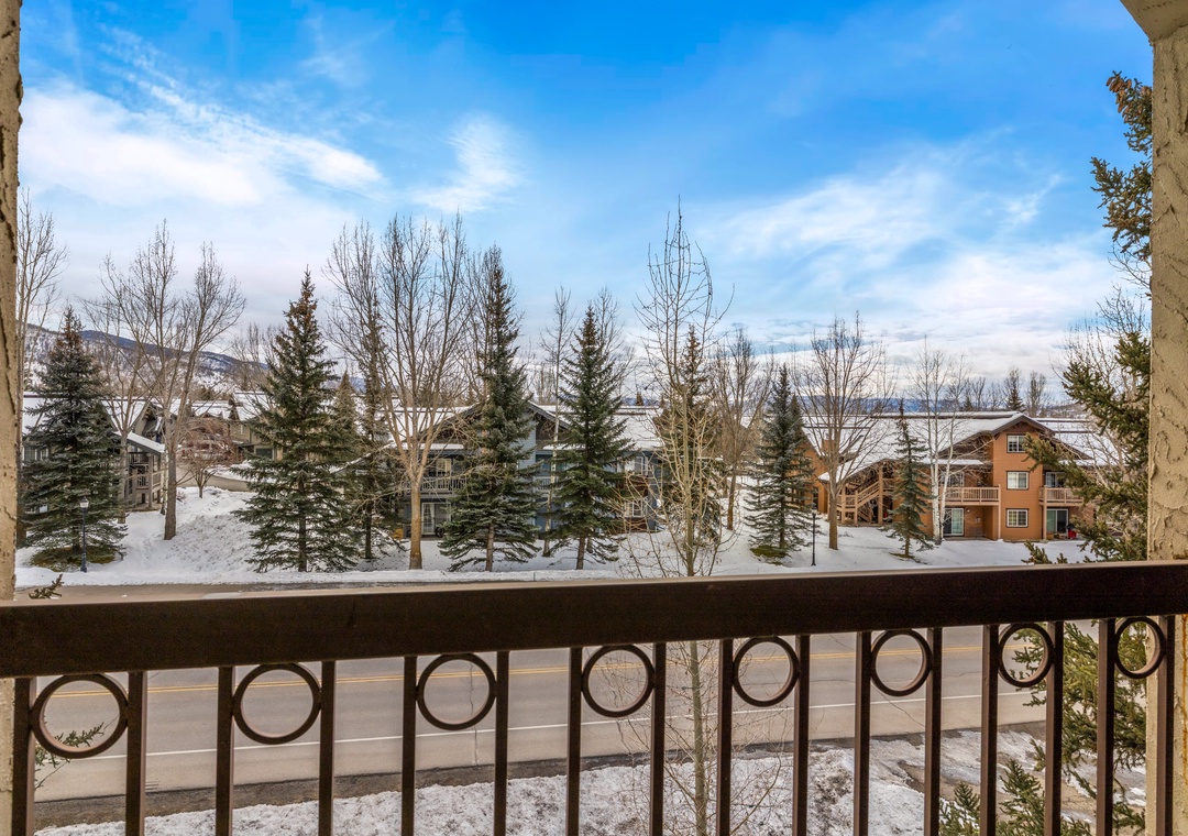 Enjoy peaceful winter mornings from your private balcony, watching snow glisten on evergreens while you sip coffee in crisp mountain air.