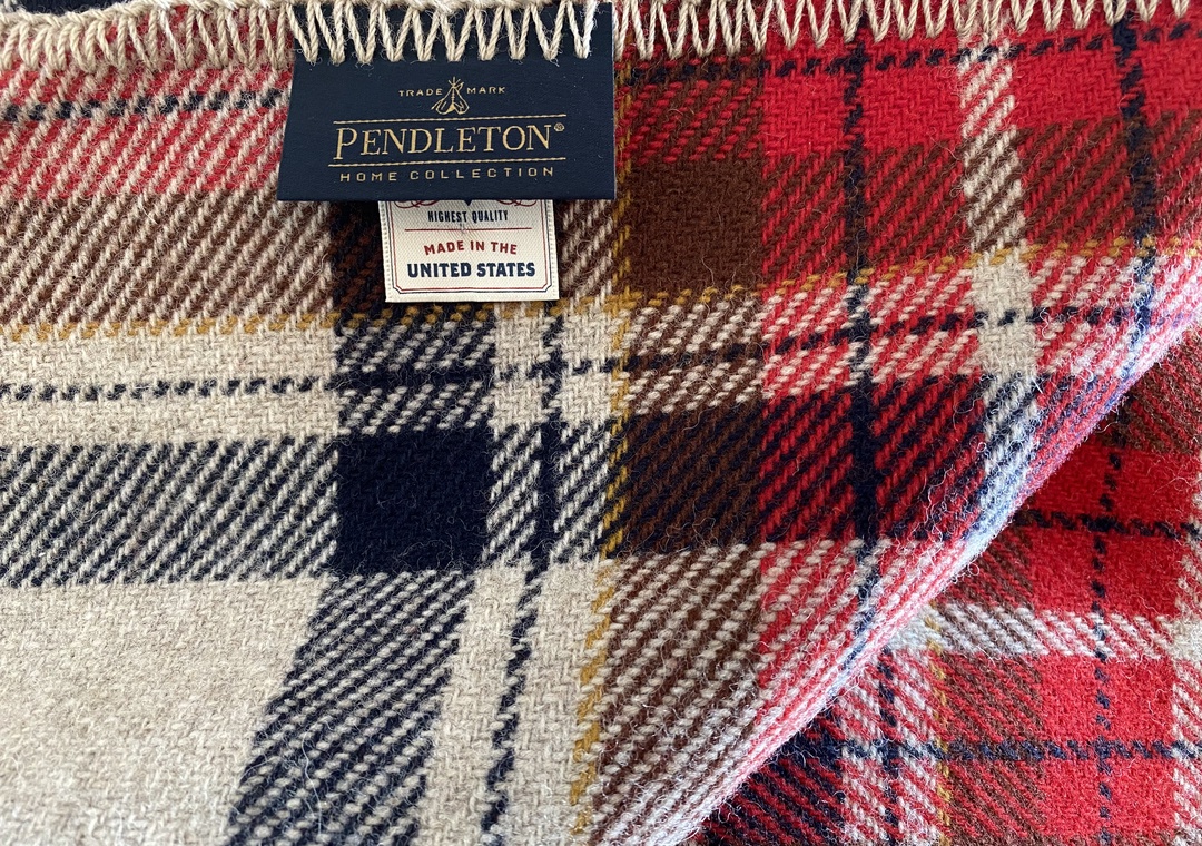 Heritage craftsmanship meets rustic charm with this classic Pendleton blanket—perfect for curling up on chilly mountain evenings or adding warmth to your cozy retreat.