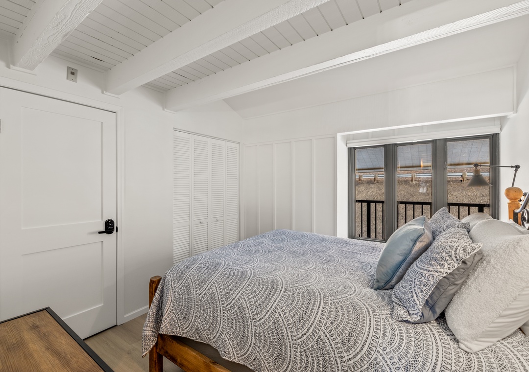 Drift off peacefully in your serene main level bedroom.