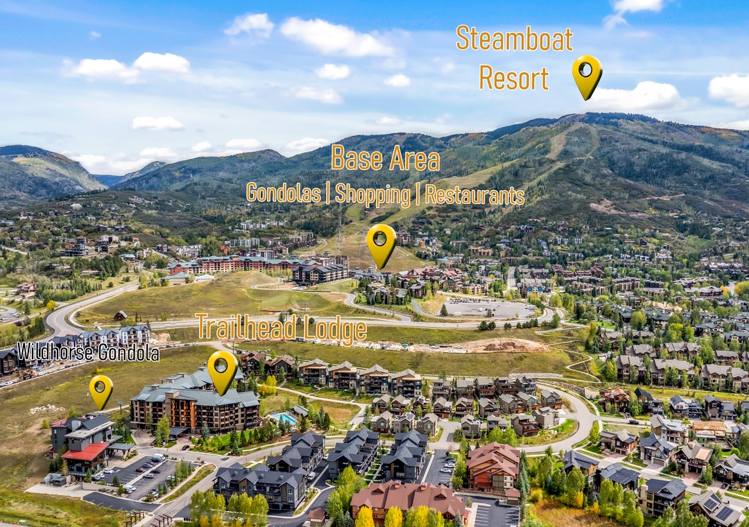 An aerial perspective of the mountain resort community, showcasing the surrounding terrain, nearby developments, and various points of interest marked on the landscape.