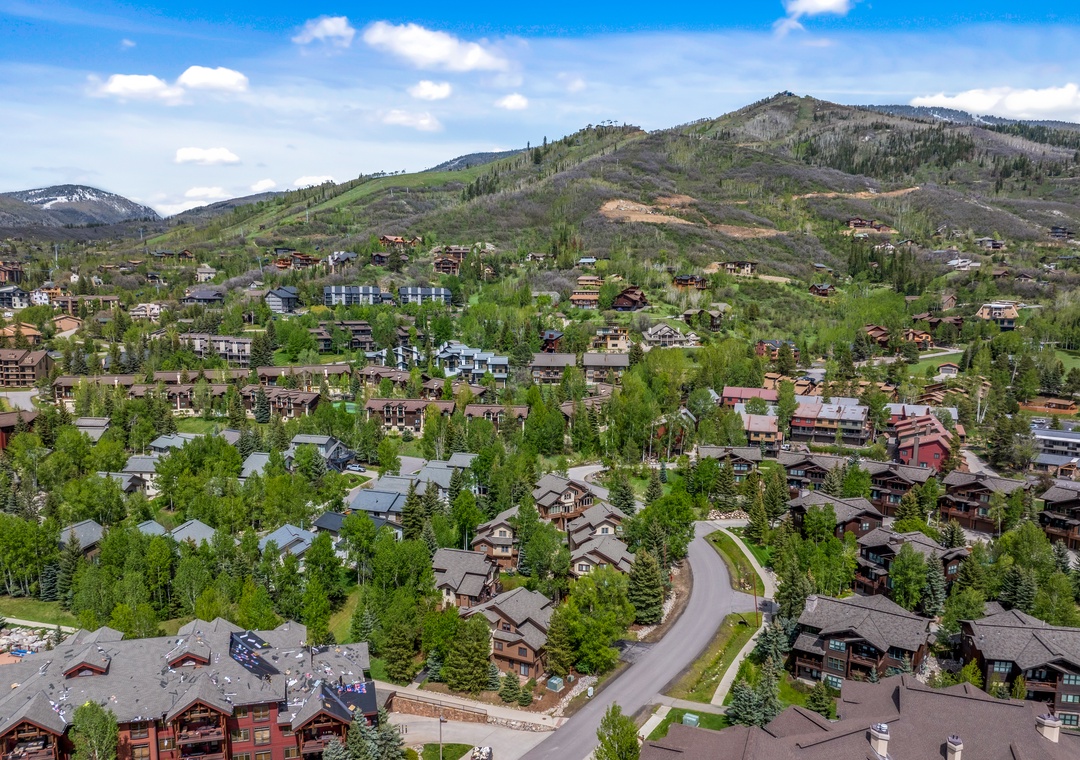 Aerial view of the property's surrounding neighborhood