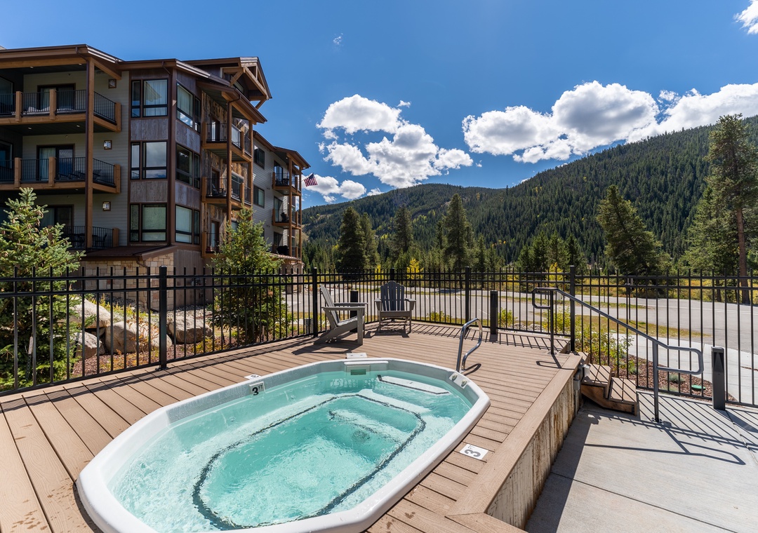 Soak in bubbling waters while mountains frame your perfect getaway. This outdoor hot tub offers pure relaxation with stunning alpine views.